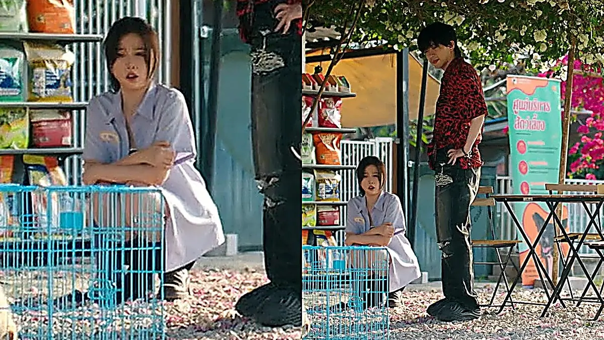 Jiang Mu crouching beside a blue wire kennel while Sanlai stands nearby in a red leopard print shirt