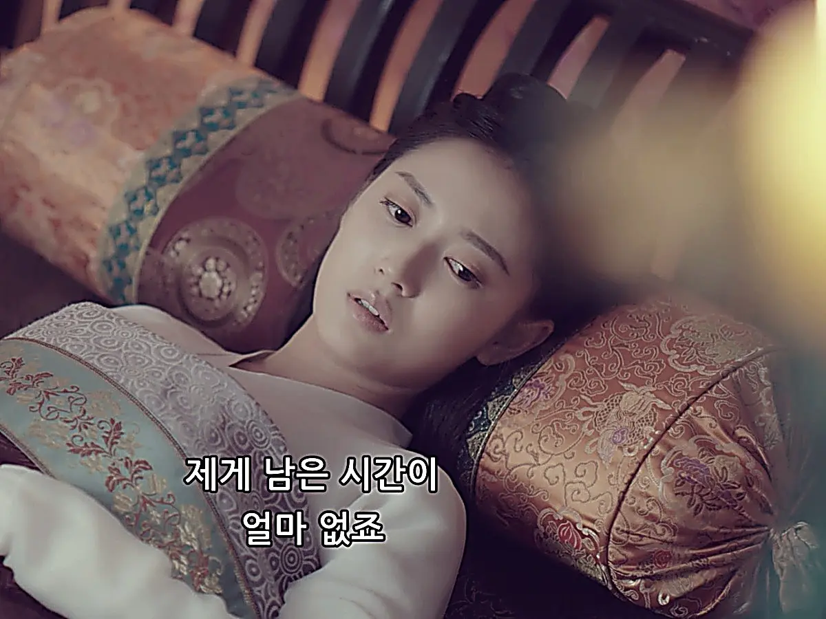Chong Xuezhi resting on her bed as she speaks about her failing health