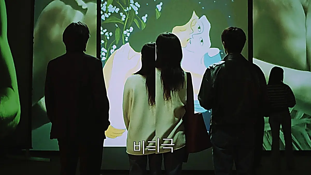 Dokgo Dal evaluating an artwork depicting a couple