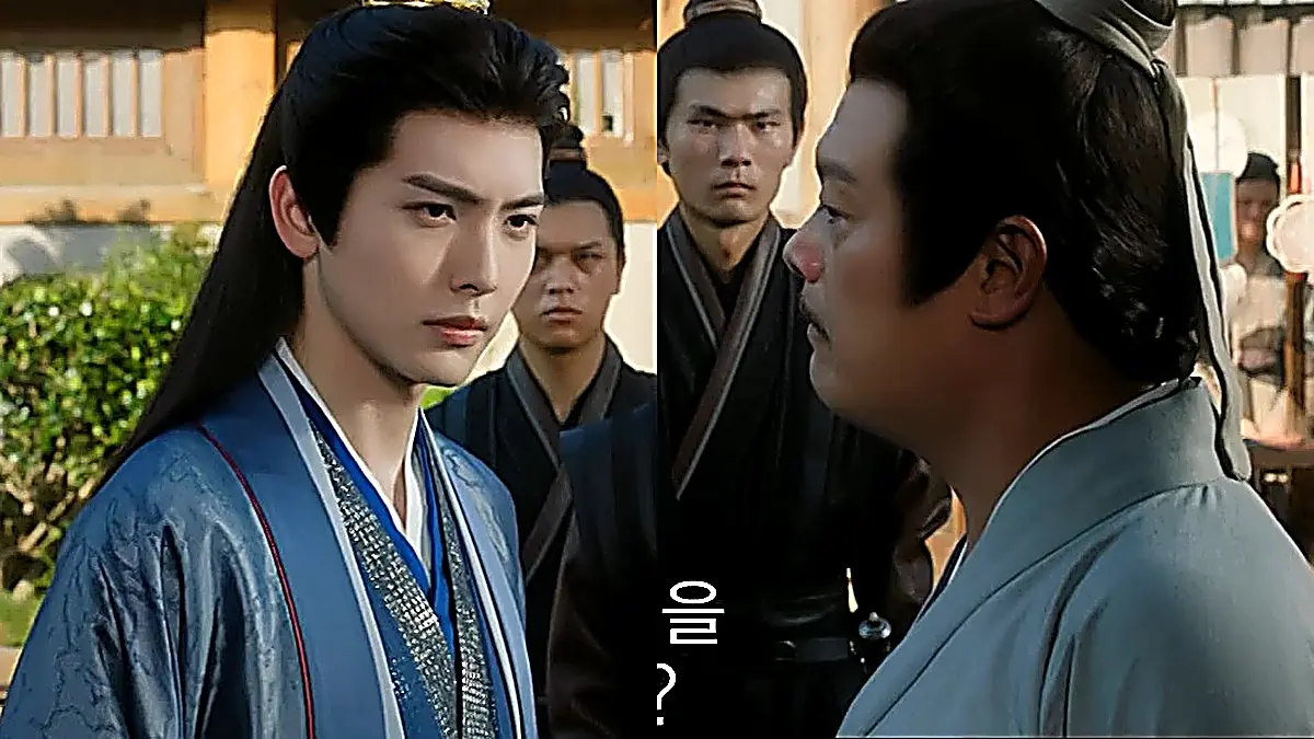 Prince Chi Li Wu wearing a slate blue layered robe with silver inner collar trim in Key to the Phoenix Heart episode 12