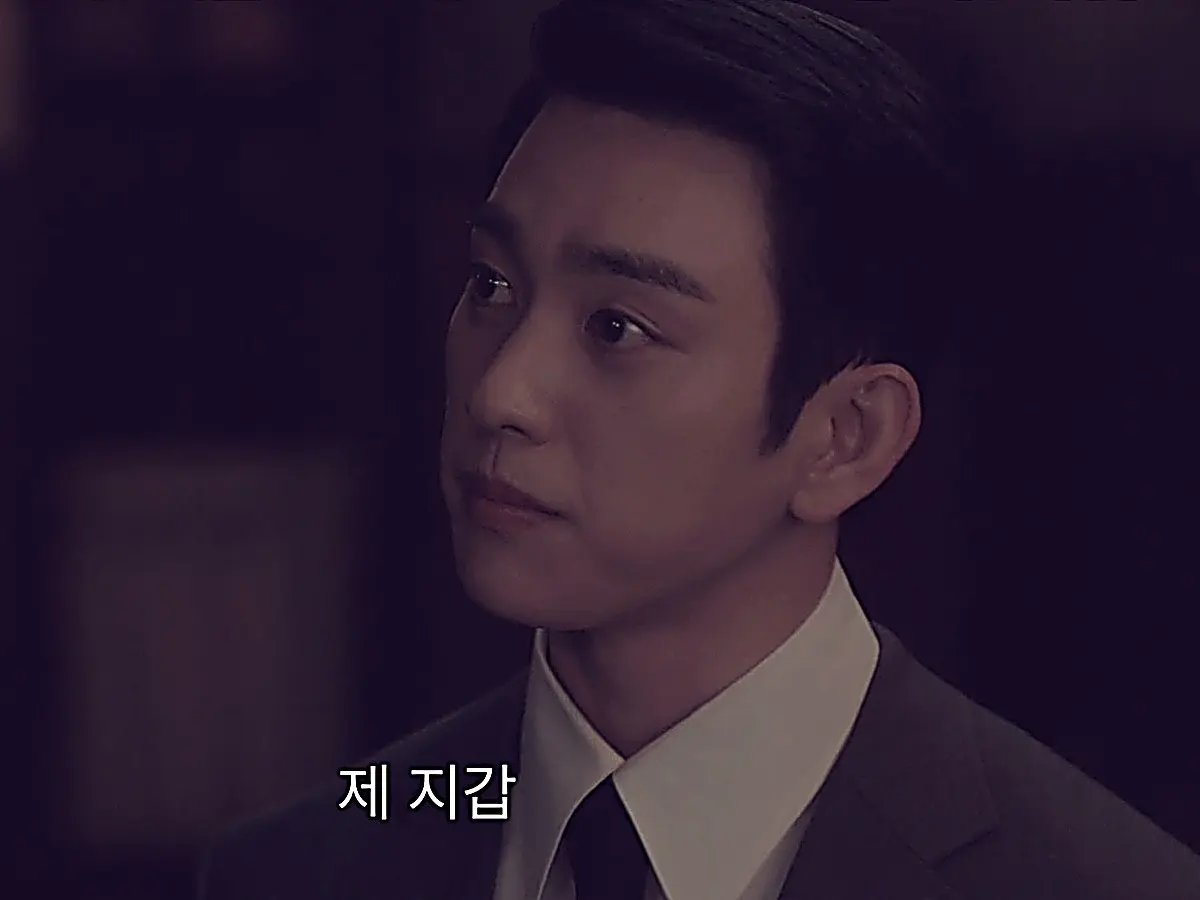 Sato Hideo in a tailored suit jacket and crisp collared shirt
