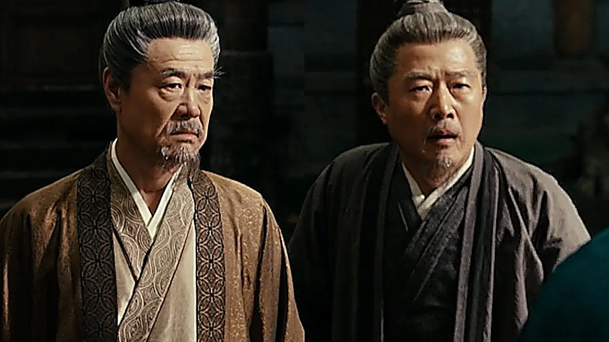 Bai Yutang glaring fiercely at the Jin family elders while demanding the antidote