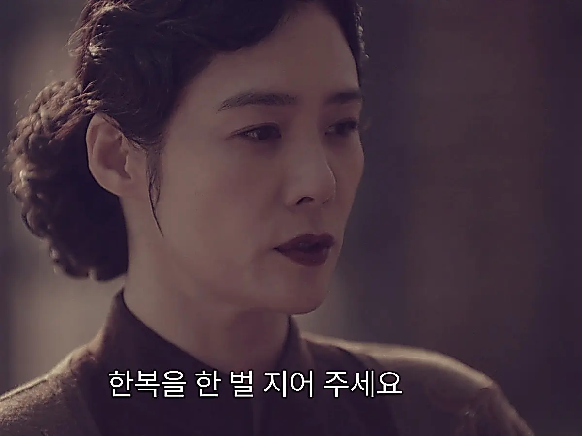 Yoo So-ran with an elegant updo hairstyle during a pivotal indoor encounter