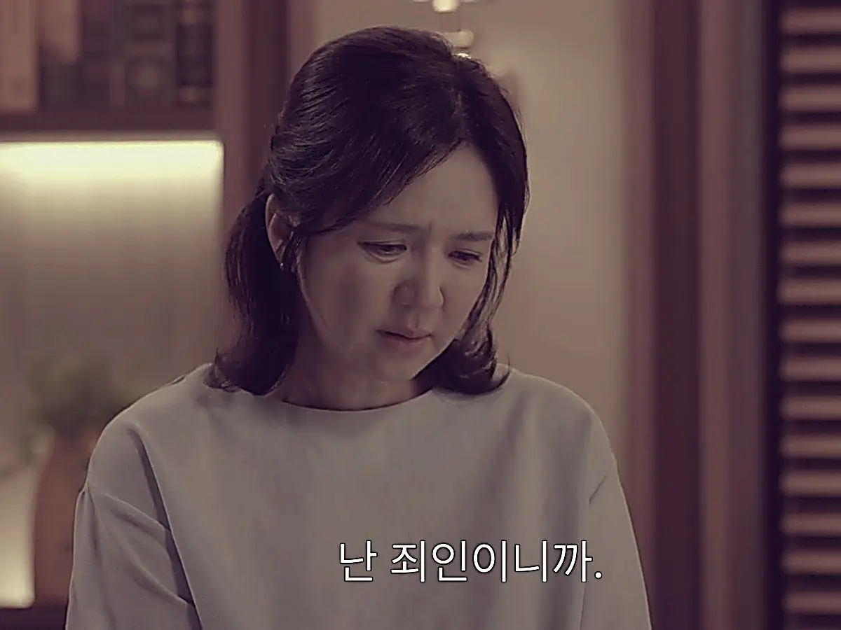Ji-ni weeping as she confronts her past feelings of guilt