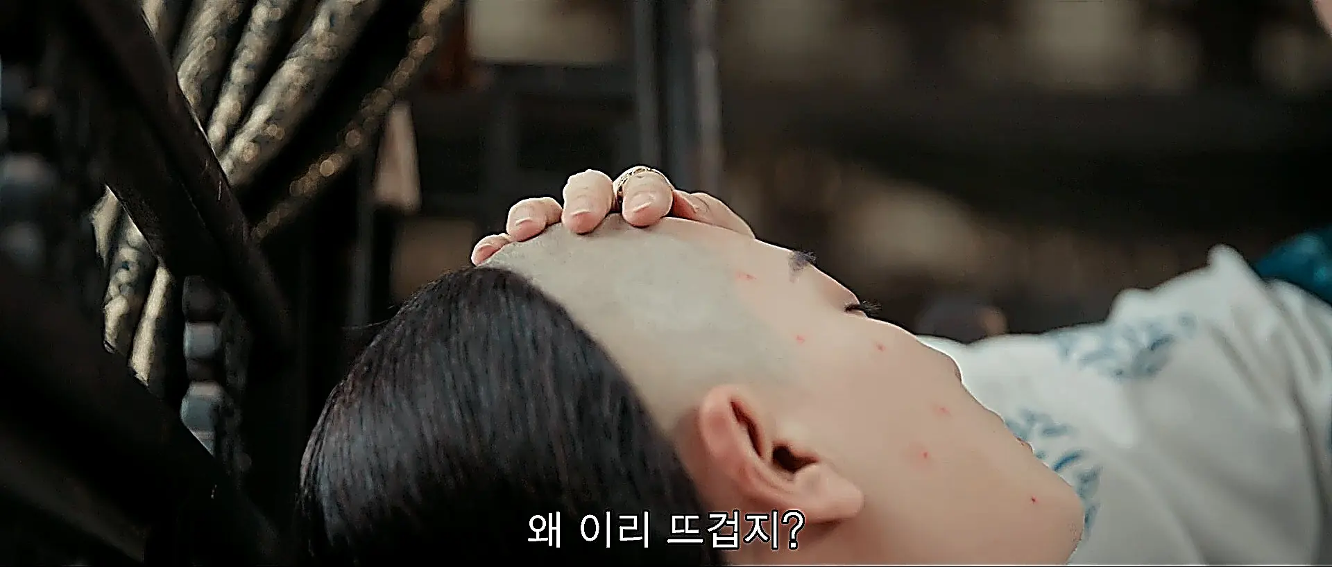 Ya Jin tending to the 14th Prince during his high fever