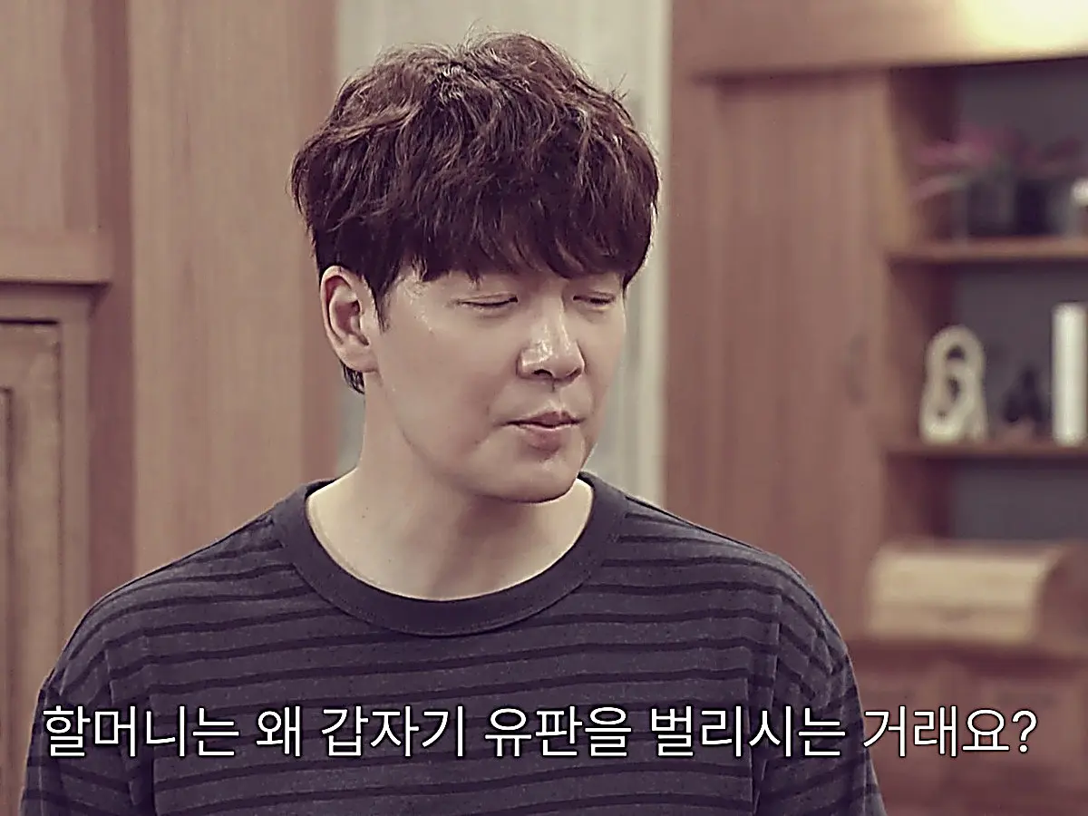 Kang Gang-nam wearing a dark horizontal striped crewneck tee in Mission: Mompossible Episode 13
