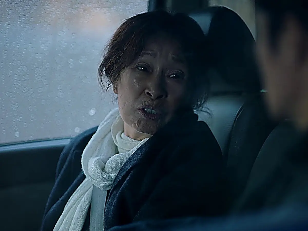 Ok-dong weeps while explaining her desperate choices to her son