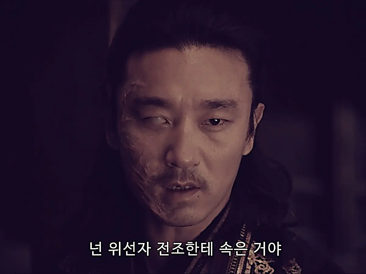 The masked assassin Yacha pressuring Zhan Zhao