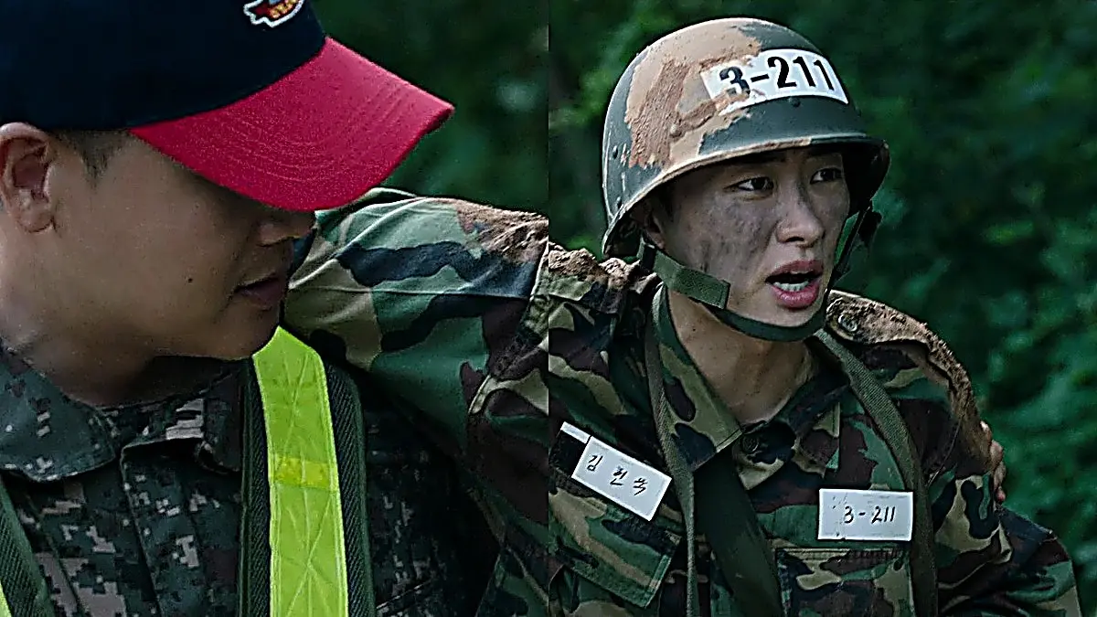Kim Hyun-wook clutching his injured knee on the obstacle course