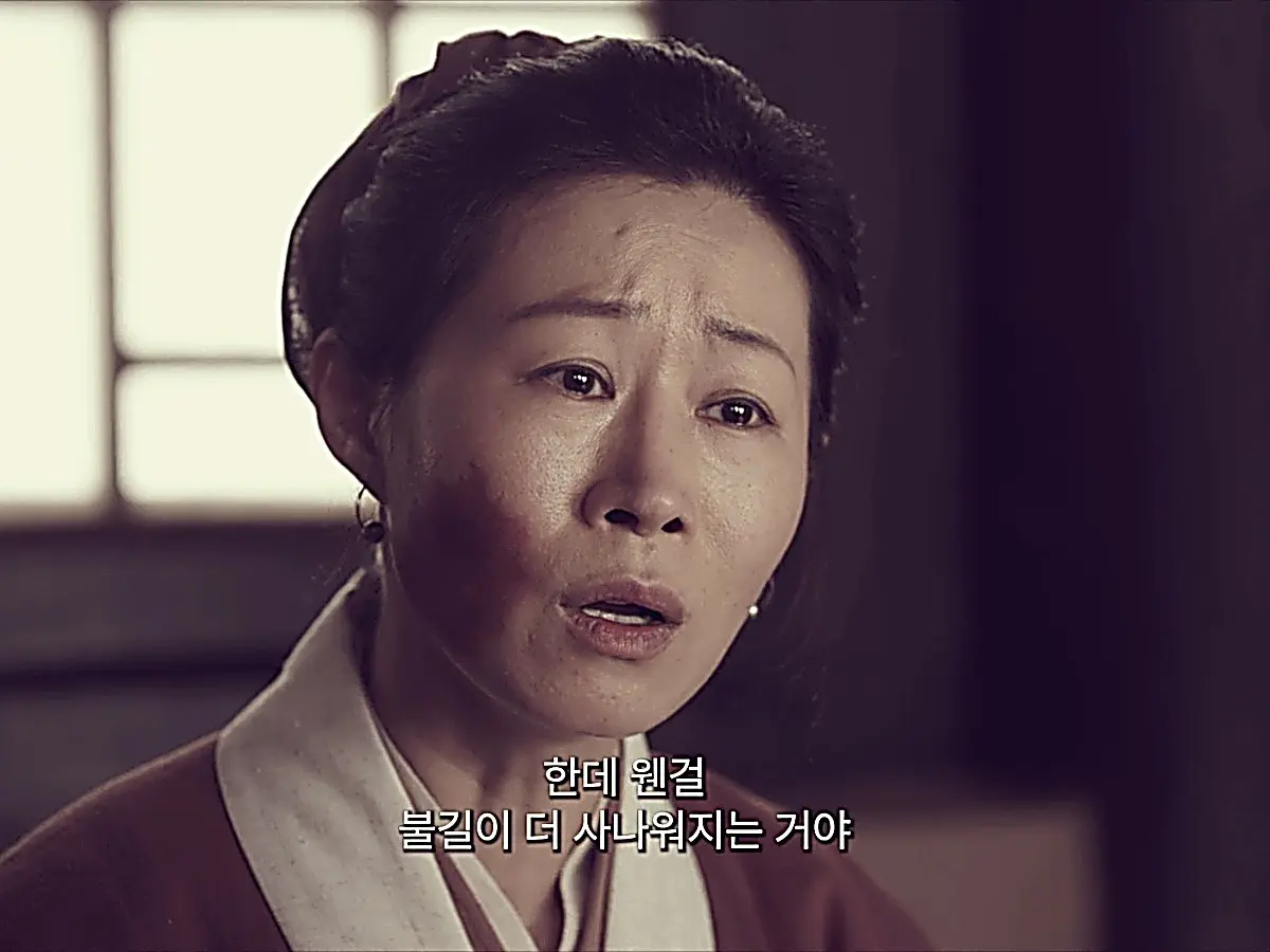 Aunt Guo explains that the fire raged fiercely despite the pouring rain