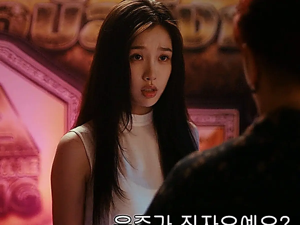 Jiang Mu reacting with shock after learning Jin Zhao fights under the alias Youzhou