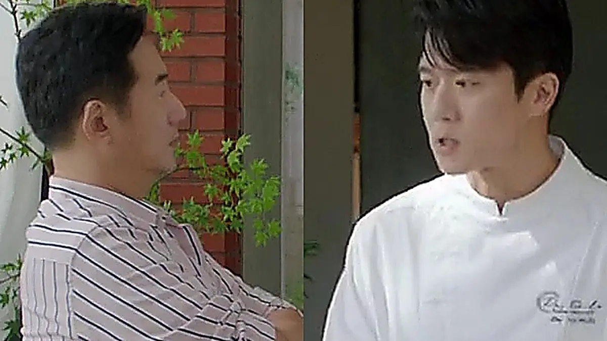Mu-jin bowing respectfully to Gyu-rim's father inside the restaurant