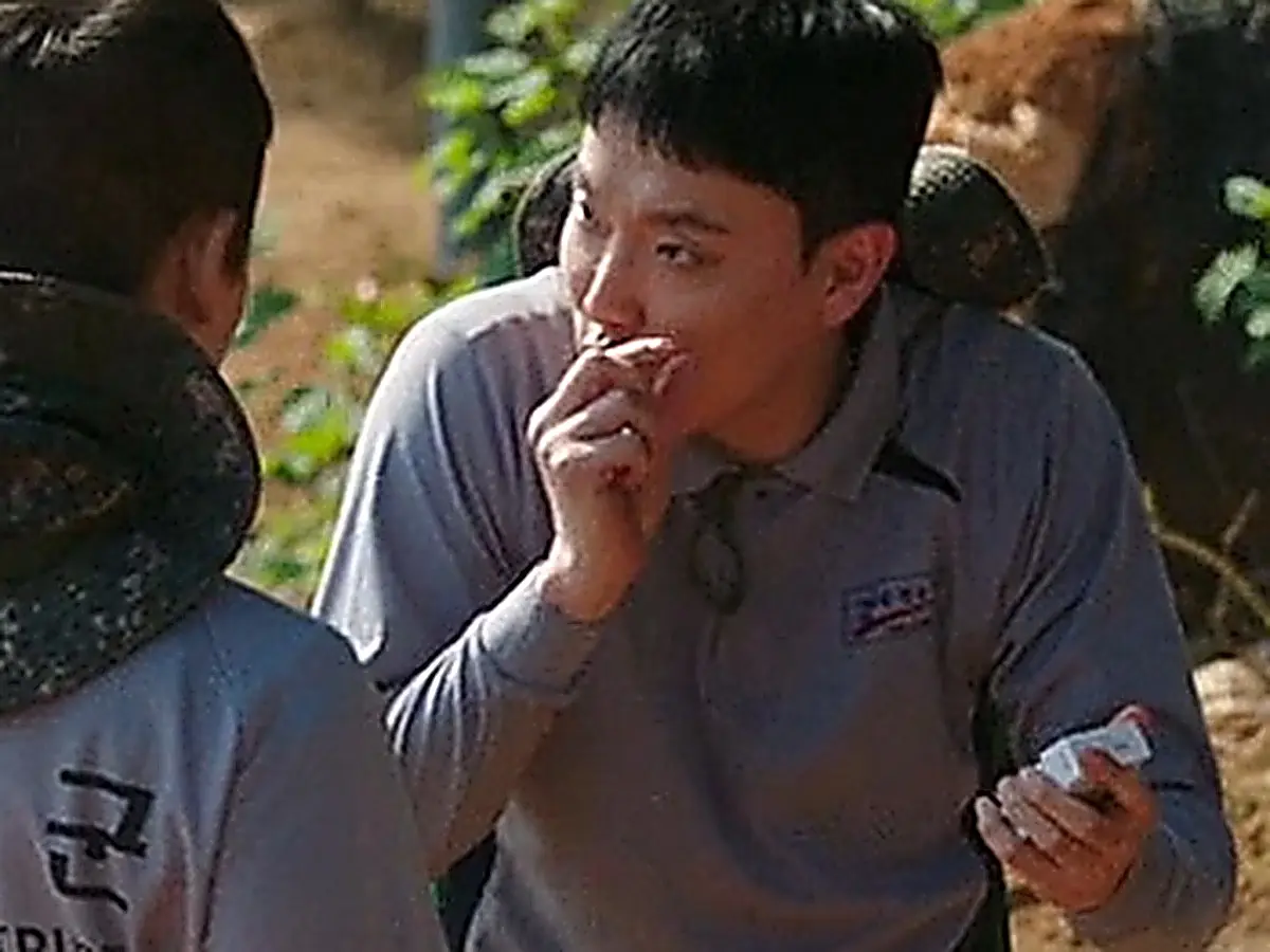 Soldiers wearing grey crewneck and polo activity shirts paired with patterned camouflage utility pants