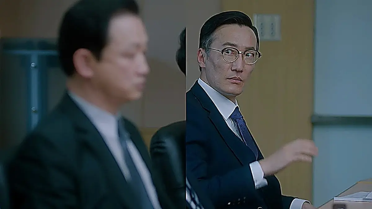 Men in suits raising their hands during a boardroom meeting