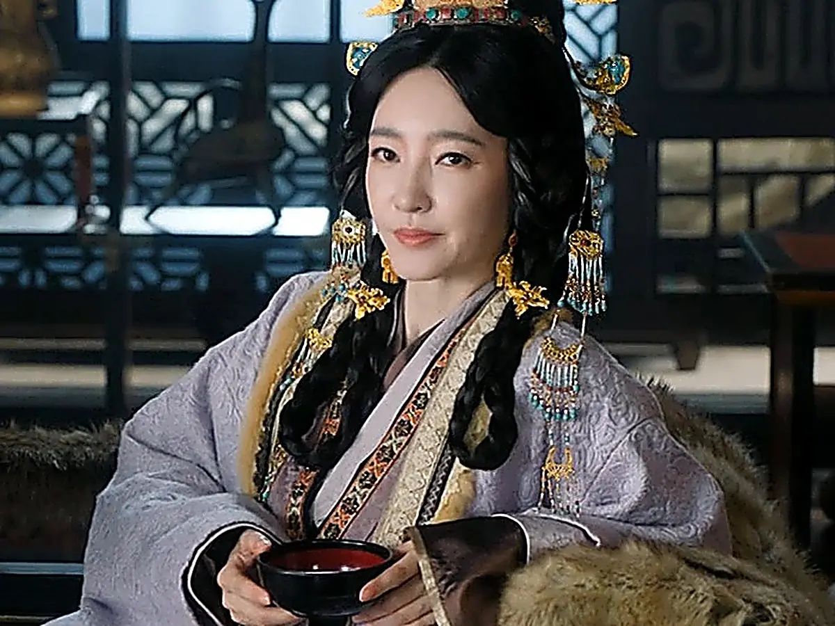 Empress Dowager Shaoyang smiling calmly after revealing her identity