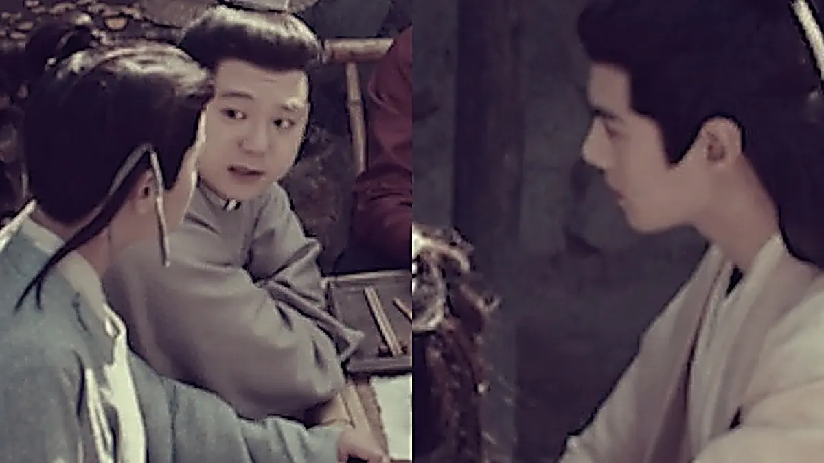 Guo Yinglong with an elaborate updo examining evidence at the table