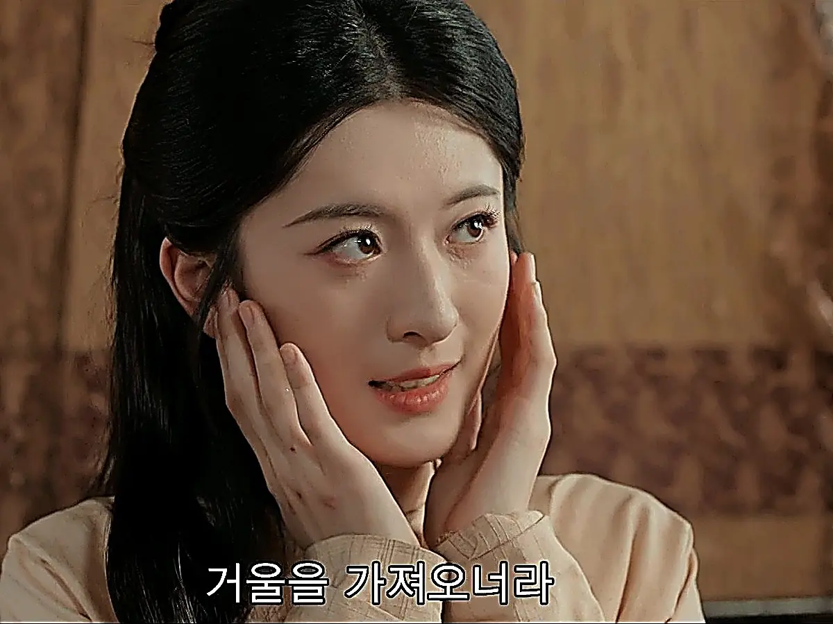 Consort Duan checking the sudden marks across her skin in the mirror