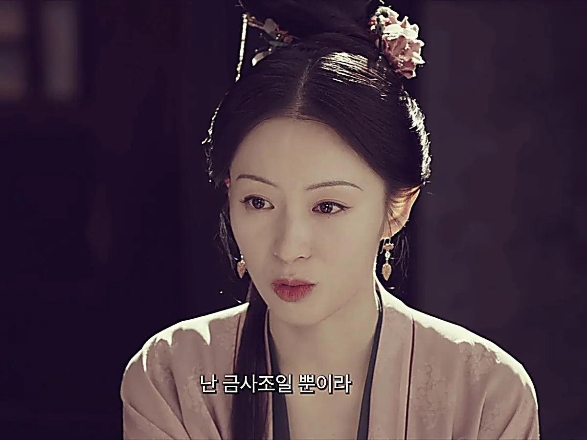 Jin Miaocui compares herself to a caged canary in a poignant flashback